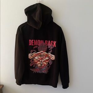 Black Hoodie with Demon Back Graphic